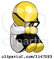 Yellow Doctor Scientist Man Sitting With Head Down Facing Angle Right