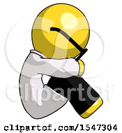 Yellow Doctor Scientist Man Sitting With Head Down Facing Sideways Right