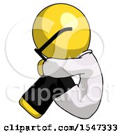 Yellow Doctor Scientist Man Sitting With Head Down Facing Sideways Left