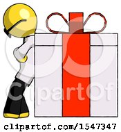 Yellow Doctor Scientist Man Gift Concept Leaning Against Large Present