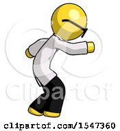 Yellow Doctor Scientist Man Sneaking While Reaching For Something