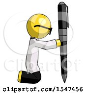 Yellow Doctor Scientist Man Posing With Giant Pen In Powerful Yet Awkward Manner