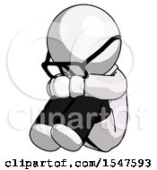 White Doctor Scientist Man Sitting With Head Down Facing Angle Left