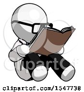 White Doctor Scientist Man Reading Book While Sitting Down