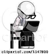 White Doctor Scientist Man Using Laptop Computer While Sitting In Chair Angled Right
