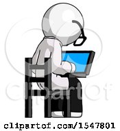 White Doctor Scientist Man Using Laptop Computer While Sitting In Chair View From Back