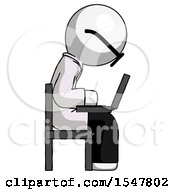 White Doctor Scientist Man Using Laptop Computer While Sitting In Chair View From Side