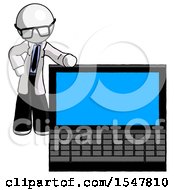 White Doctor Scientist Man Beside Large Laptop Computer Leaning Against It