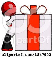 Red Doctor Scientist Man Gift Concept Leaning Against Large Present