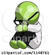 Green Doctor Scientist Man Sitting With Head Down Facing Angle Left