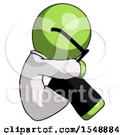 Green Doctor Scientist Man Sitting With Head Down Facing Sideways Right