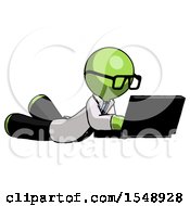 Poster, Art Print Of Green Doctor Scientist Man Using Laptop Computer While Lying On Floor Side Angled View