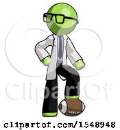 Poster, Art Print Of Green Doctor Scientist Man Standing With Foot On Football