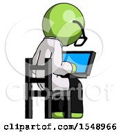 Green Doctor Scientist Man Using Laptop Computer While Sitting In Chair View From Back