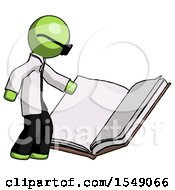Green Doctor Scientist Man Reading Big Book While Standing Beside It