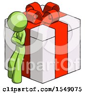 Green Design Mascot Woman Leaning On Gift With Red Bow Angle View
