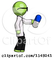 Green Doctor Scientist Man Holding Blue Pill Walking To Right