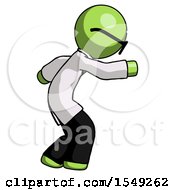 Green Doctor Scientist Man Sneaking While Reaching For Something