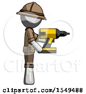Gray Explorer Ranger Man Using Drill Drilling Something On Right Side
