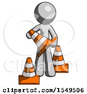 Gray Design Mascot Man Holding A Traffic Cone