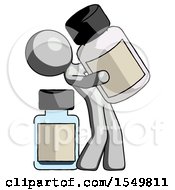 Gray Design Mascot Man Holding Large White Medicine Bottle With Bottle In Background