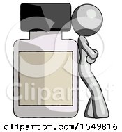 Gray Design Mascot Woman Leaning Against Large Medicine Bottle