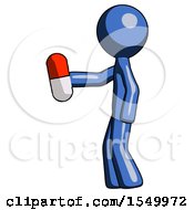 Blue Design Mascot Man Holding Red Pill Walking To Left