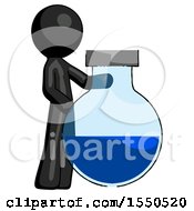 Black Design Mascot Man Standing Beside Large Round Flask Or Beaker