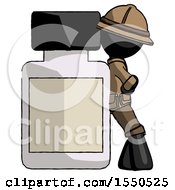 Black Explorer Ranger Man Leaning Against Large Medicine Bottle