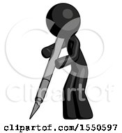 Black Design Mascot Man Cutting With Large Scalpel