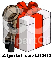 Poster, Art Print Of Black Explorer Ranger Man Leaning On Gift With Red Bow Angle View