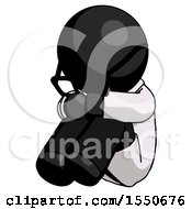 Black Doctor Scientist Man Sitting With Head Down Facing Angle Left