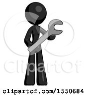 Black Design Mascot Woman Holding Large Wrench With Both Hands