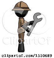Black Explorer Ranger Man Using Wrench Adjusting Something To Right