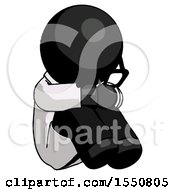 Black Doctor Scientist Man Sitting With Head Down Facing Angle Right