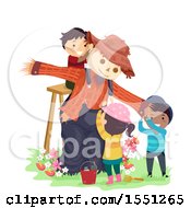 Poster, Art Print Of Group Of Children Putting Up A Scarecrow