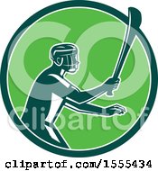 Poster, Art Print Of Retro Male Hurling Player Holding A Wooden Hurley Stick In A Green Circle