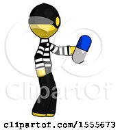 Yellow Thief Man Holding Blue Pill Walking To Right