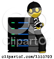 Poster, Art Print Of Yellow Thief Man Resting Against Server Rack Viewed At Angle