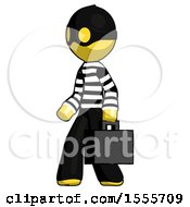 Poster, Art Print Of Yellow Thief Man Walking With Briefcase To The Left