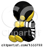 Poster, Art Print Of Yellow Thief Man Sitting With Head Down Facing Angle Left