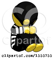 Yellow Thief Man Sitting With Head Down Facing Angle Right