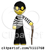 Poster, Art Print Of Yellow Thief Man Standing With Hiking Stick