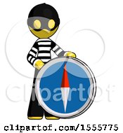 Poster, Art Print Of Yellow Thief Man Standing Beside Large Compass