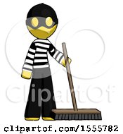 Yellow Thief Man Standing With Industrial Broom