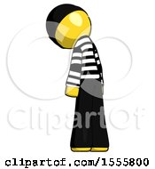 Poster, Art Print Of Yellow Thief Man Depressed With Head Down Back To Viewer Left