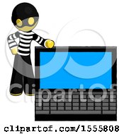 Poster, Art Print Of Yellow Thief Man Beside Large Laptop Computer Leaning Against It