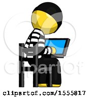 Poster, Art Print Of Yellow Thief Man Using Laptop Computer While Sitting In Chair View From Back