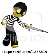 Yellow Thief Man Sword Pose Stabbing Or Jabbing