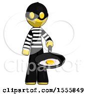 Yellow Thief Man Frying Egg In Pan Or Wok